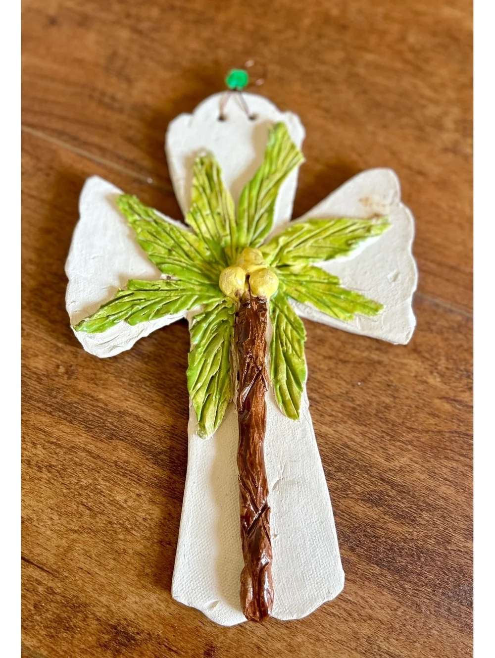 Hurricane Cross Decorative Wall Hanging with Palm Tree Design